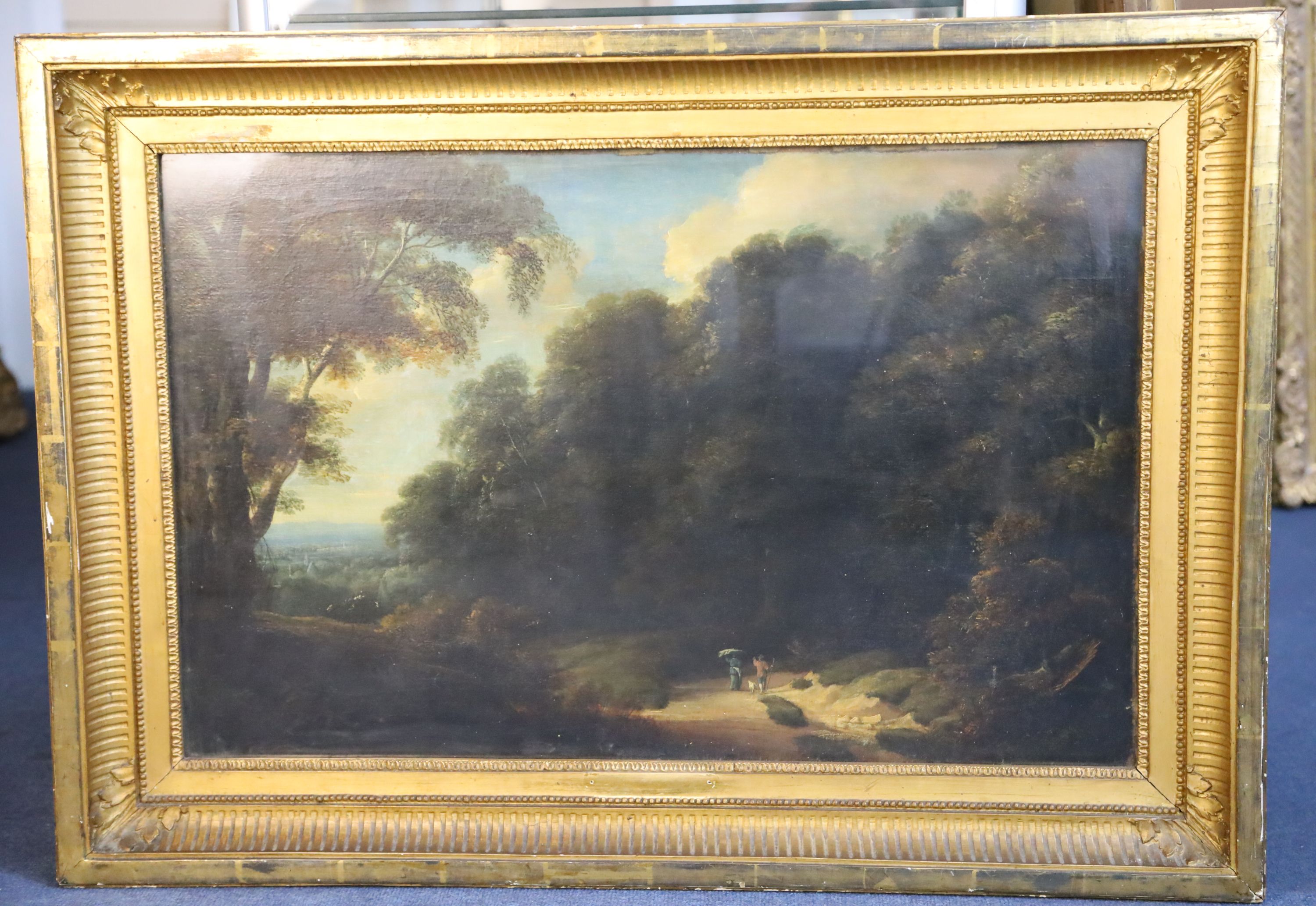 Early 19th century English School Travellers in a wooded landscape 19 x 29.25in.